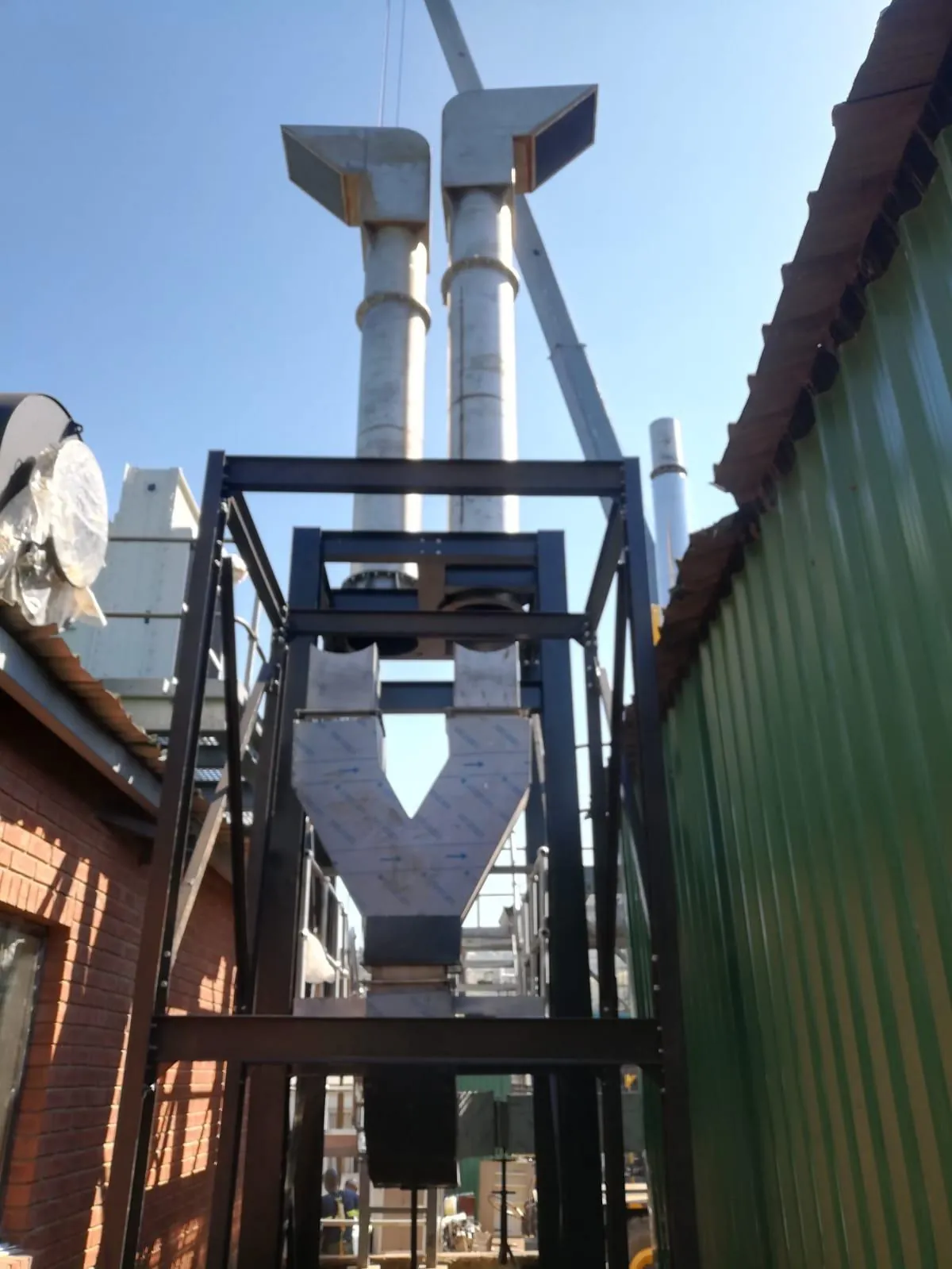 Exhaust stacks and structure delivered as a turnkey project