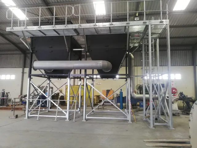 Hoppers and access platform with galvanised handrails